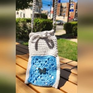 By Butterfly Knit By Lisa,  cell phone bag, blue and grey.